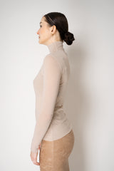 D. Exterior Stretch Tulle Turtleneck Top in Nude Pink Vancouver. Shop Online or in Store.