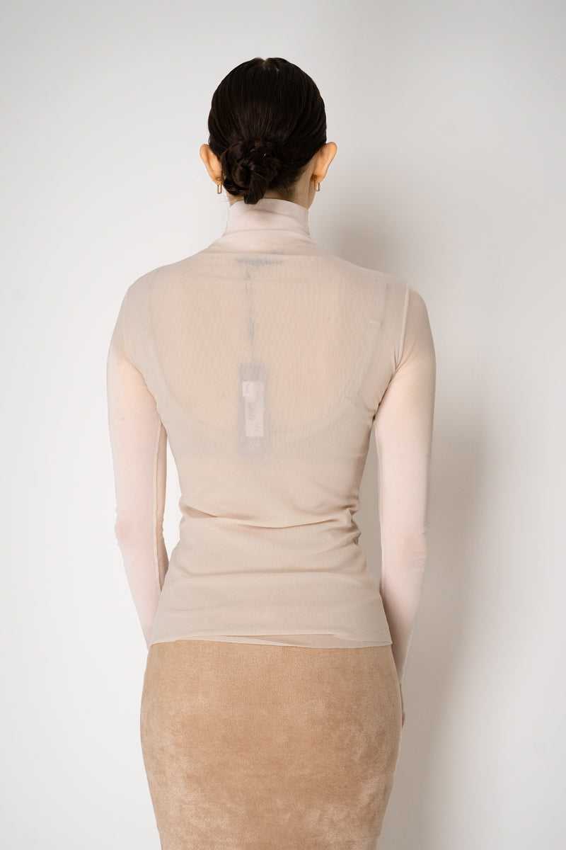 D. Exterior Stretch Tulle Turtleneck Top in Nude Pink Vancouver. Shop Online or in Store.