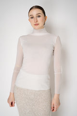 D. Exterior Stretch Tulle Turtleneck Top in White Vancouver. Shop Online or in Store.