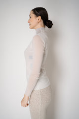 D. Exterior Stretch Tulle Turtleneck Top in White Vancouver. Shop Online or in Store.