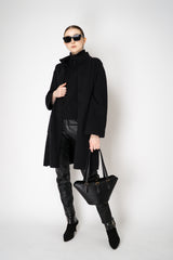 D. Exterior Wool Cashmere Stockinette Stitch Knit Vest in Black Vancouver. Shop Online or in Store.