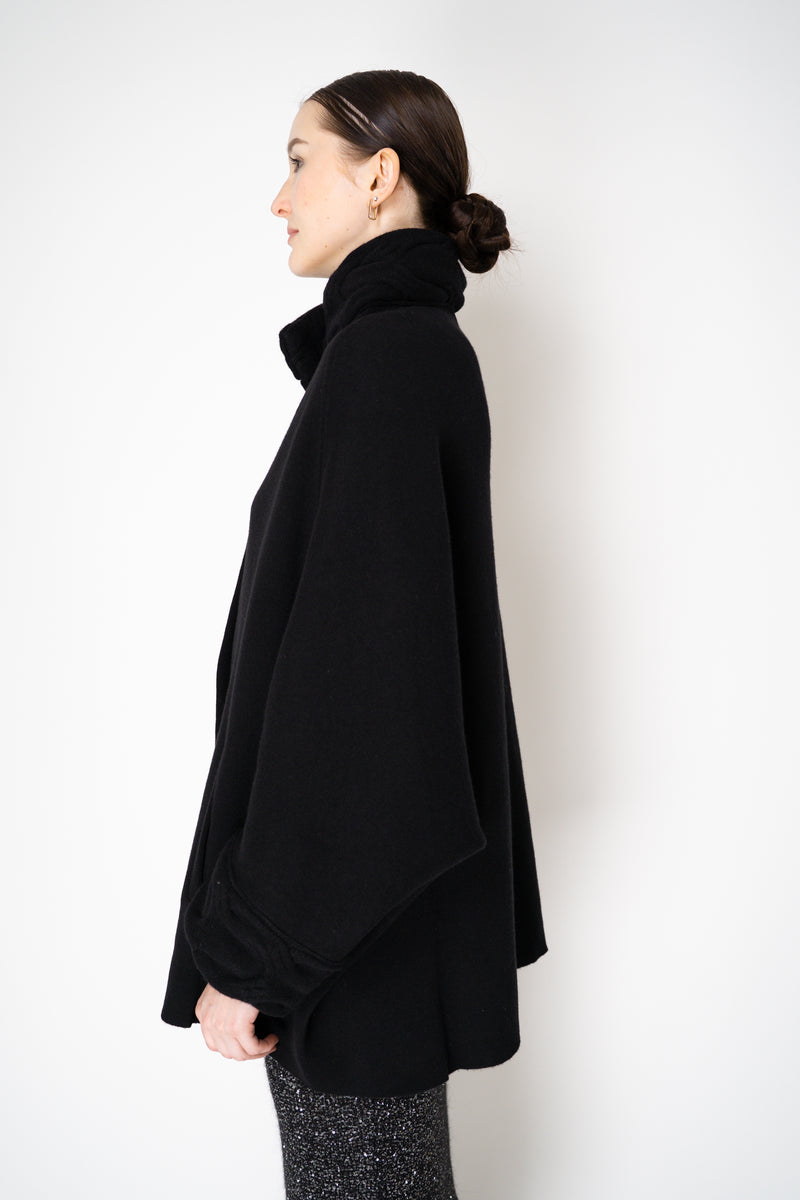 D. Exterior Wool Cashmere Stretch Knit Cape Coat in Black Vancouver. Shop Online or in Store.
