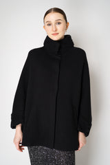 D. Exterior Wool Cashmere Stretch Knit Cape Coat in Black Vancouver. Shop Online or in Store.