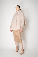 D. Exterior Wool Cashmere Stretch Knit Cape Coat in Light Rosewood Pink Vancouver. Shop Online or in Store.