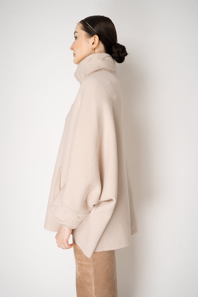 D. Exterior Wool Cashmere Stretch Knit Cape Coat in Light Rosewood Pink Vancouver. Shop Online or in Store.