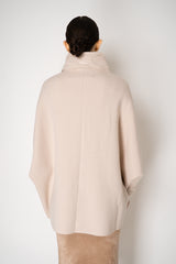 D. Exterior Wool Cashmere Stretch Knit Cape Coat in Light Rosewood Pink Vancouver. Shop Online or in Store.