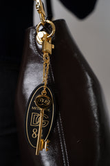 Dolce & Gabbana Hotel Metropol Keychain in Gold Vancouver. Shop Online or in Store.