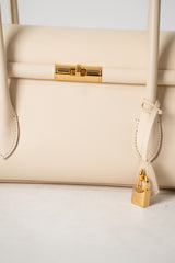 Dolce & Gabbana Marlene Baguette Handbag in Palmellato Calfskin in Cream Vancouver. Shop Online or in Store.