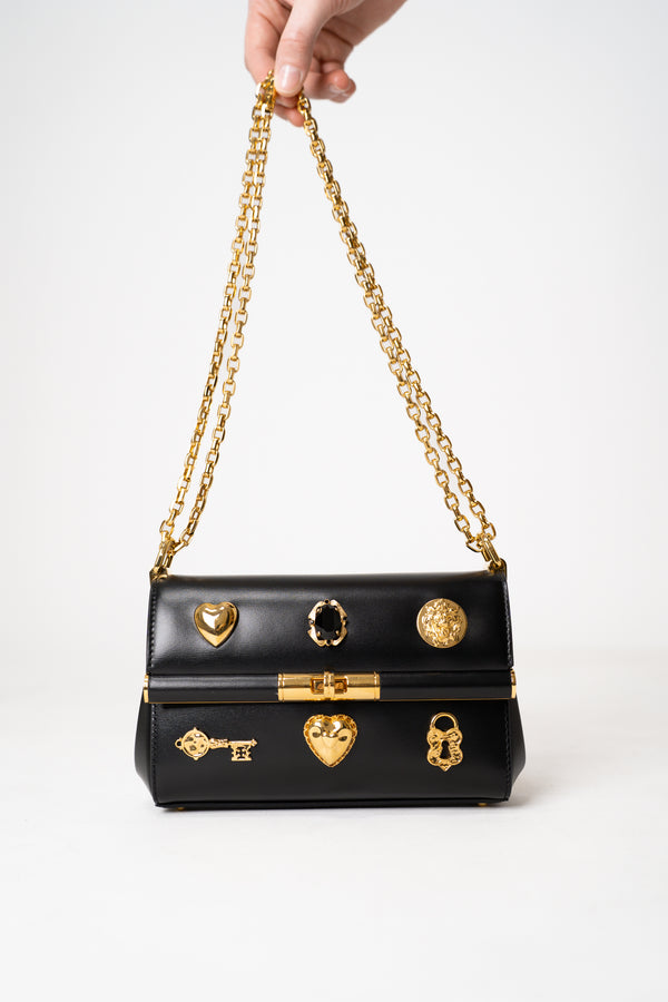Dolce & Gabbana Mini Marlene City Bag with Gold Charms in Black Vancouver. Shop Online or in Store.