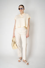 Dorothee Schumacher Cotton Piqué Cropped Polo Shirt in Butter Vancouver. Shop Online or in Store.