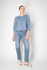 Dorothee Schumacher Cropped Round Neck Cardigan with Flounce Hem in Blue Vancouver. Shop Online or in Store