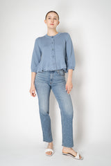 Dorothee Schumacher Cropped Round Neck Cardigan with Flounce Hem in Blue Vancouver. Shop Online or in Store