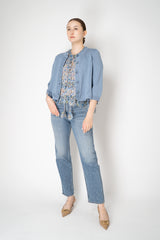 Dorothee Schumacher Cropped Round Neck Cardigan with Flounce Hem in Blue Vancouver. Shop Online or in Store