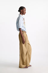 Dorothee Schumacher Garment Washed Cotton Poplin Pleated Pants in Brown Vancouver. Shop Online or in Store.