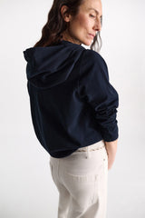Dorothee Schumacher Long Sleeve Top with Hood Layered Look in Navy Vancouver. Shop Online or in Store.