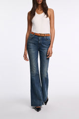 Dorothee Schumacher Mid Rise Flared Jeans in Mid Dark Blue Vancouver. Shop Online or in Store.