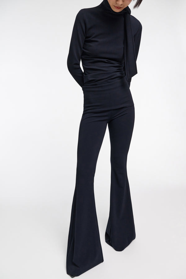 Dorothee Schumacher Slim Pants with Flared Leg in Navy. Shop Online or in Store.