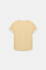 Dorothee Schumacher Stretch Cotton Shrunken T-Shirt with Contrast Trim in Pastel Yellow Vancouver. Shop Online or in Store.