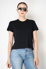 Dorothee Schumacher Stretch Cotton T-shirt with Back Pompom Detail in Black Vancouver. Shop Online or in Store
