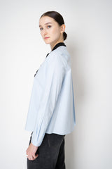 Dorothee Schumacher Stretch Poplin Blouse with Draped Bow in Icy Blue Vancouver. Shop Online or in Store.