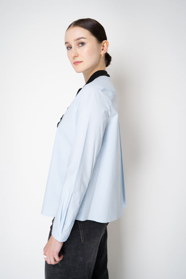 Dorothee Schumacher Stretch Poplin Blouse with Draped Bow in Icy Blue Vancouver. Shop Online or in Store.