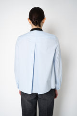 Dorothee Schumacher Stretch Poplin Blouse with Draped Bow in Icy Blue Vancouver. Shop Online or in Store.