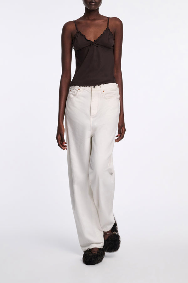 Dorothee Schumacher Tapered Leg Mid Rise Baggy Jeans in White Vancouver. Shop Online or in Store.