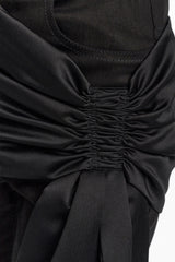 Dorothee Schumacher Tapered Leg Skinny Jeans with Satin Bow in Black Vancouver. Shop Online or in Store.