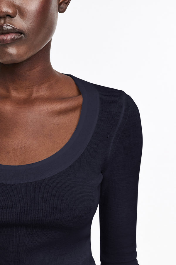 Dorothee Schumacher Virgin Wool Knit Pullover with Deep Scoop Neck in Navy Vancouver. Shop Online or in Store.