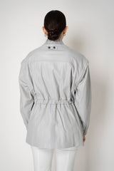 Fabiana Filippi Cinched Leather Safari Jacket with Removable Sleeves in Light Grey Vancouver. Shop Online or in Store.