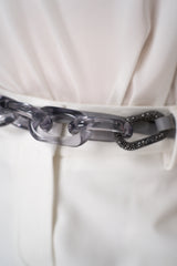 Fabiana Filippi Leather Belt with Plexi Chain and Filo Diamante Details in Cobblestone Vancouver. Shop Online or in Store.
