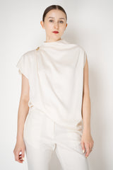 Fabiana Filippi Shiny Enver Satin Draped Blouse With Knot Pin in Ivory Vancouver. Shop Online or in Store