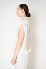 Fabiana Filippi Shiny Enver Satin Draped Blouse With Knot Pin in Ivory Vancouver. Shop Online or in Store
