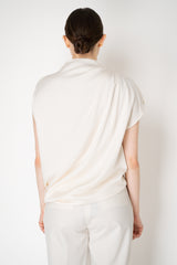 Fabiana Filippi Shiny Enver Satin Draped Blouse With Knot Pin in Ivory Vancouver. Shop Online or in Store