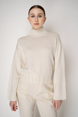 Fabiana Filippi Virgin Wool Knit Cropped Turtleneck Pullover in Ivory Vancouver. Shop Online or in Store.