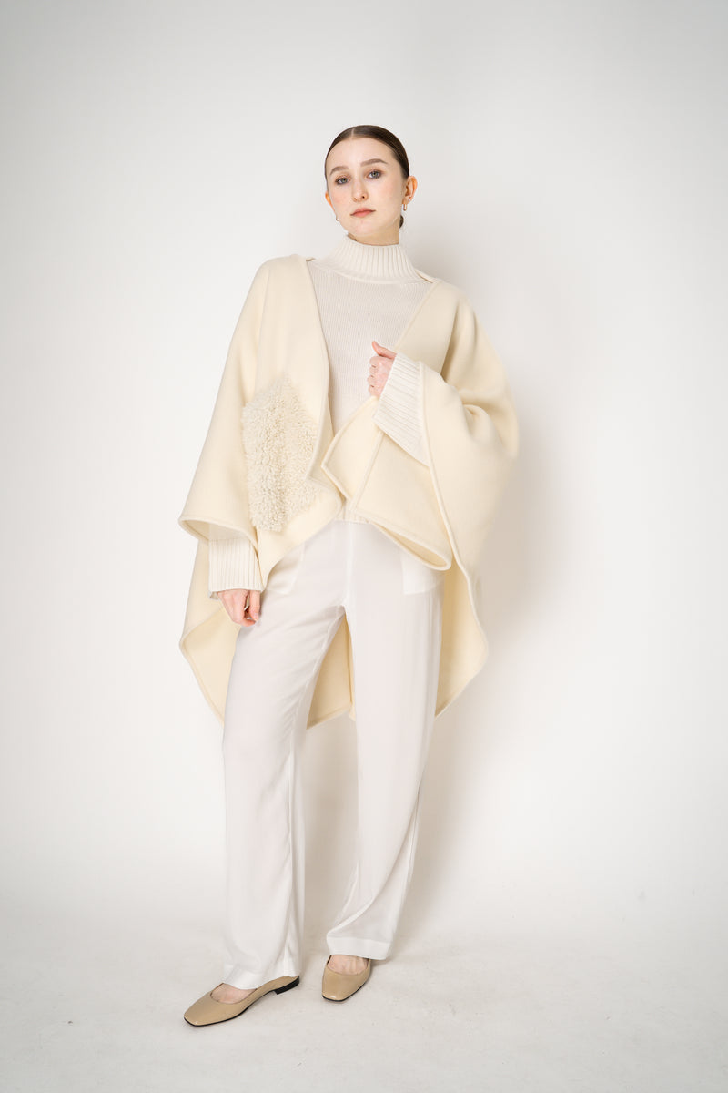Fabiana Filippi Virgin Wool Knit Cropped Turtleneck Pullover in Ivory Vancouver. Shop Online or in Store.
