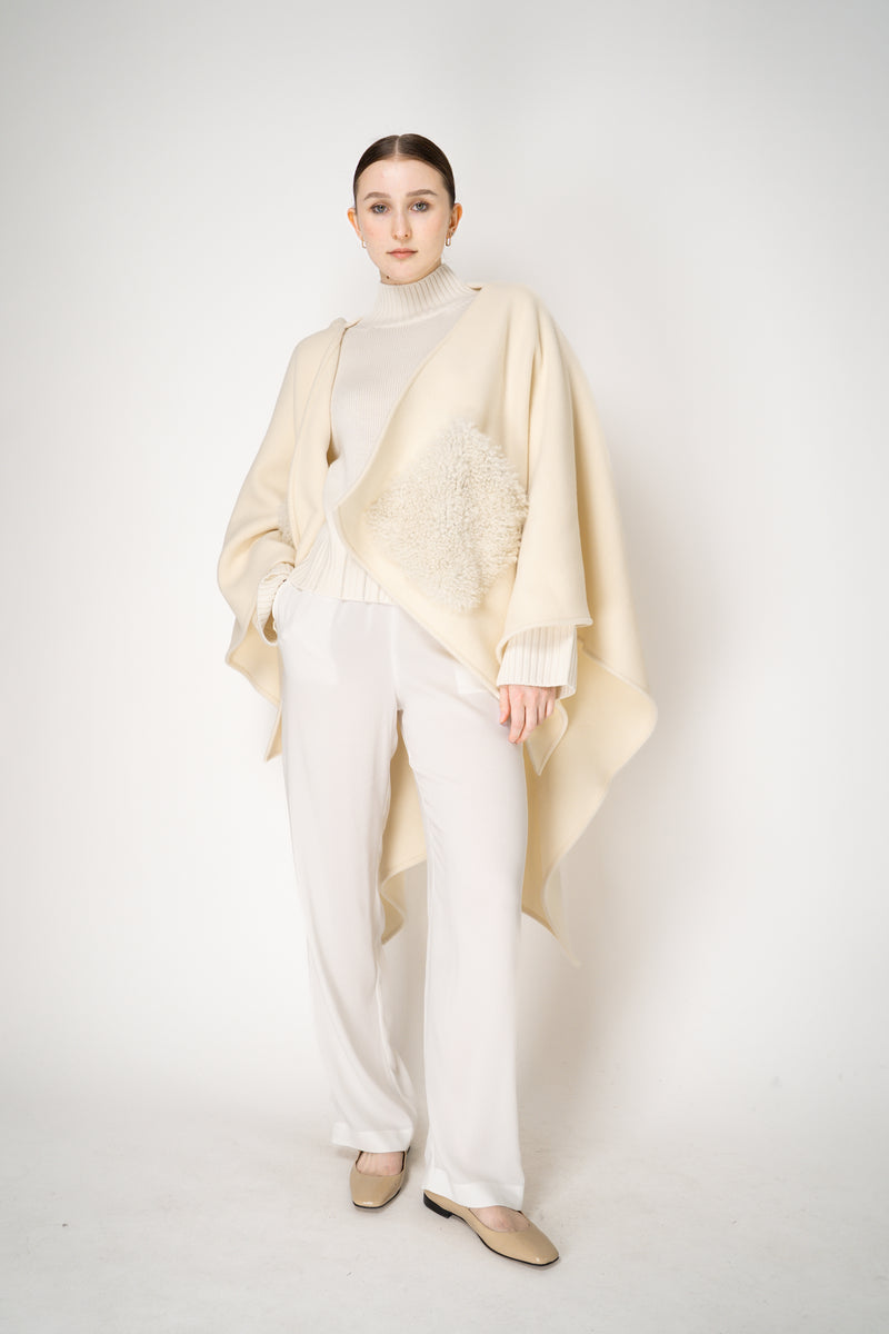 Fabiana Filippi Virgin Wool Knit Cropped Turtleneck Pullover in Ivory Vancouver. Shop Online or in Store.