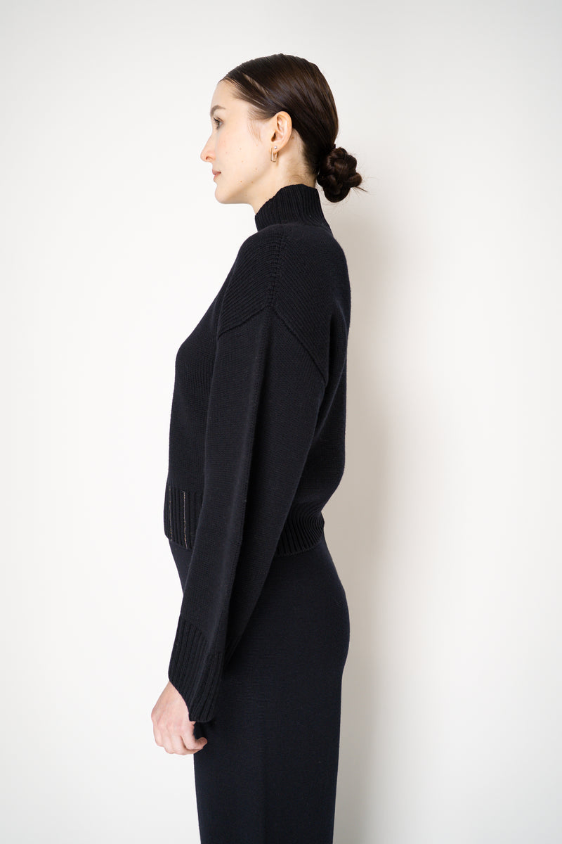 Fabiana Filippi Virgin Wool Knit Cropped Turtleneck Pullover in Navy Vancouver. Shop Online or in Store.
