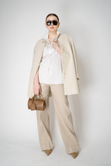 Herno High Neck Sequined Coat in Oat Vancouver. Shop Online or in Store.