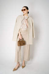 Herno High Neck Sequined Coat in Oat Vancouver. Shop Online or in Store.