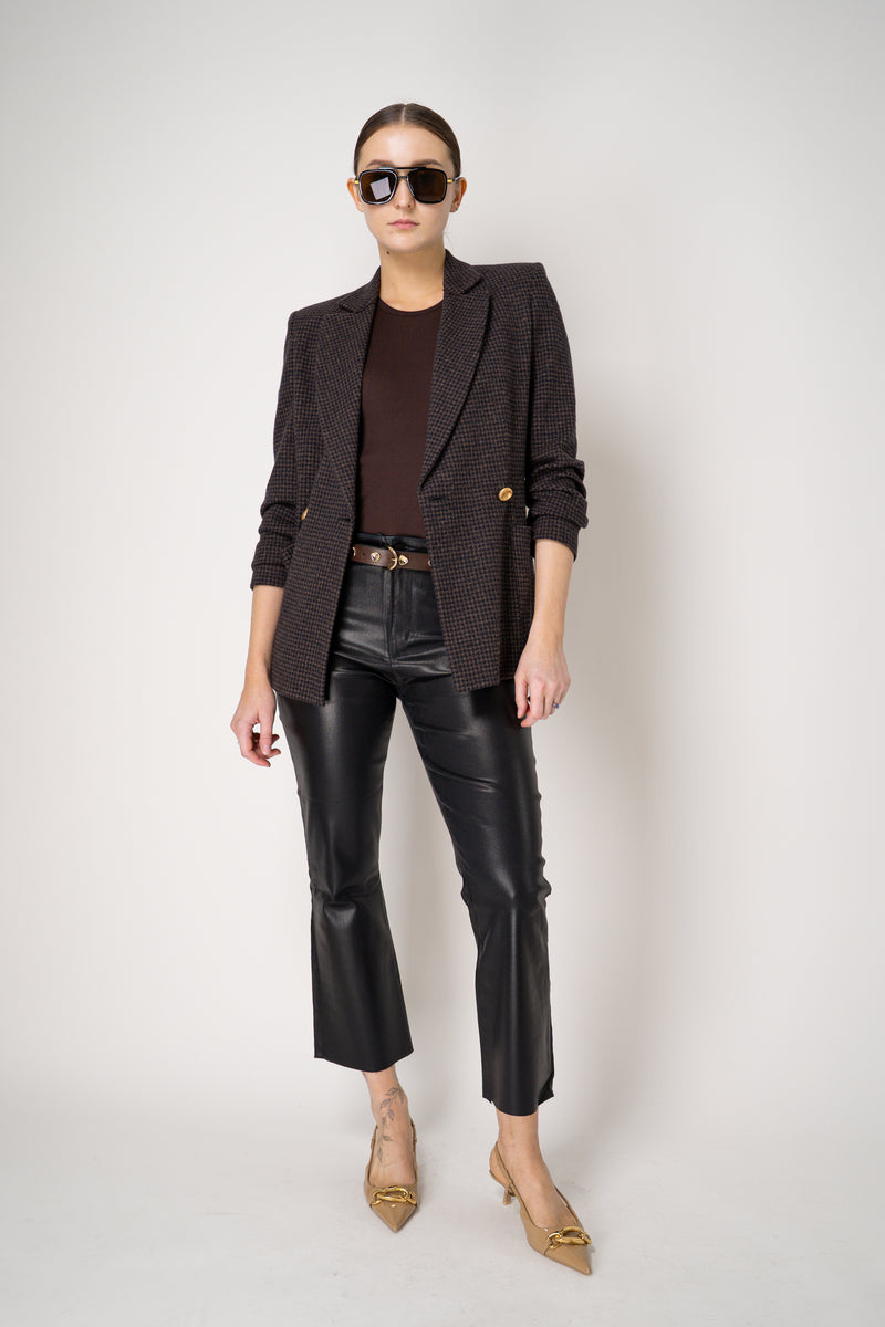 L'Agence Kendra Coated Cropped Flared Jeans in Black Navy Vancouver. Shop Online or in Store.