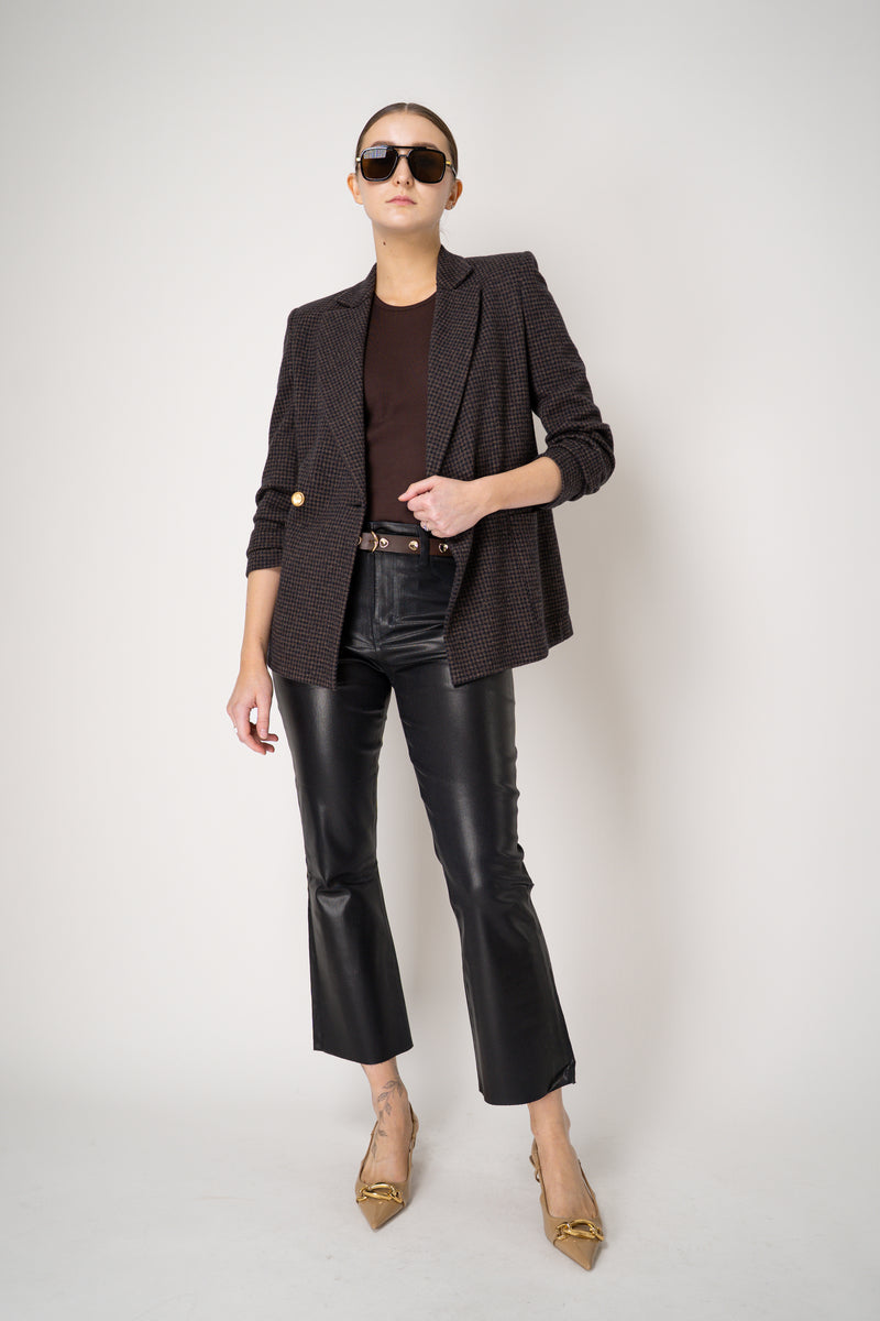 L'Agence Kendra Coated Cropped Flared Jeans in Black Navy Vancouver. Shop Online or in Store.