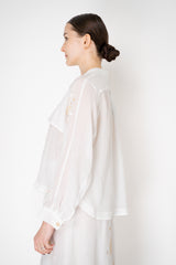 Lorena Antoniazzi Cropped Front Ramie Jacket with Floral Beaded Embroidered Sleeves in White Vancouver. Shop Online or in Store.