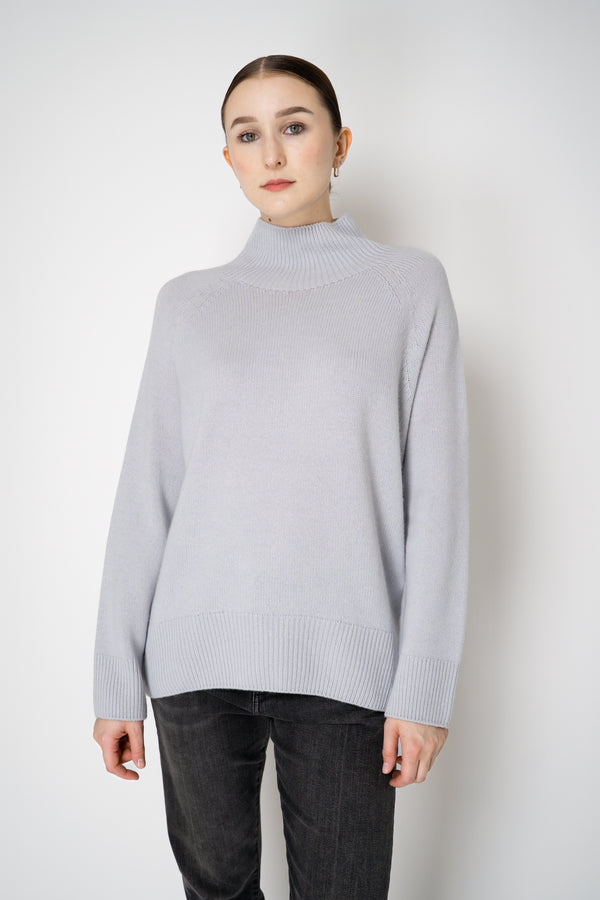 Lorena Antoniazzi Funnel Neck Cashmere Knit Pullover in Ice Blue Grey Vancouver. Shop Online or in Store.