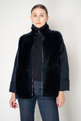 Lorena Antoniazzi High Neck Shearling Coat with Wool Sleeves in Navy Vancouver. Shop Online or in Store.