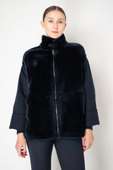 Lorena Antoniazzi High Neck Shearling Coat with Wool Sleeves in Navy Vancouver. Shop Online or in Store.