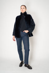 Lorena Antoniazzi High Neck Shearling Coat with Wool Sleeves in Navy Vancouver. Shop Online or in Store.