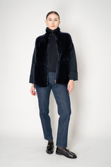 Lorena Antoniazzi High Neck Shearling Coat with Wool Sleeves in Navy Vancouver. Shop Online or in Store.