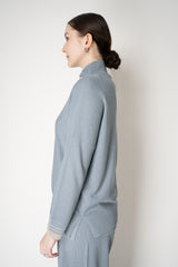 Lorena Antoniazzi Liquid Drape Knit Zip Pullover in Slate Blue Vancouver. Shop Online or in Store.