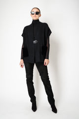 Manzoni 24 Wool Cashmere Knit Poncho with Shearling Pockets in Black Vancouver. Shop Online or in Store